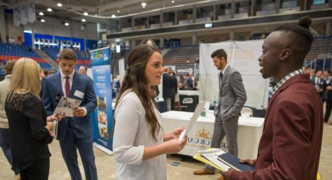 Students and employers at UNH Career Fair Event